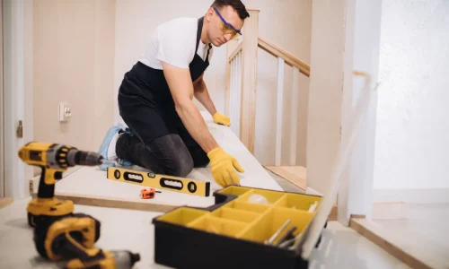 maintenance-man-fixing-a-new-floor-2026-03-24-11-23-27-utc_(1)[1]